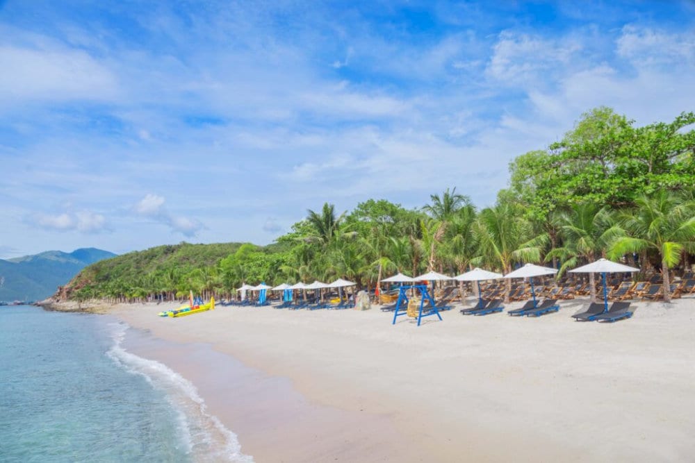 This pebbly beach offers crystal-clear water perfect for snorkeling and relaxing by the shore